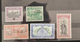 Collection of vintage stamps from New Zealand and Cook Islands on a clear background