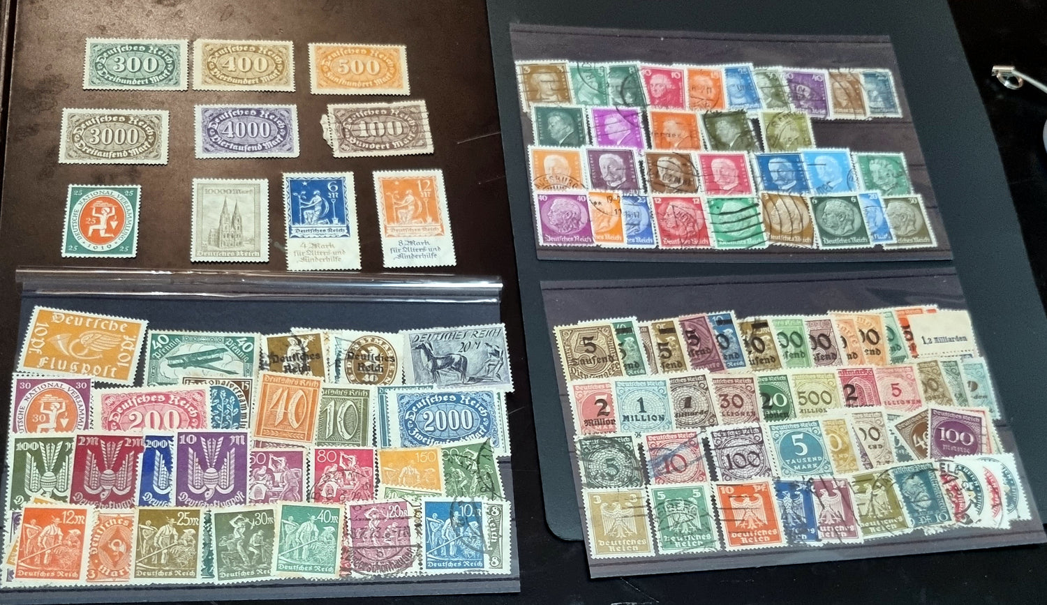 A selection of vintage German stamps from various regions and periods, displayed in a row.
