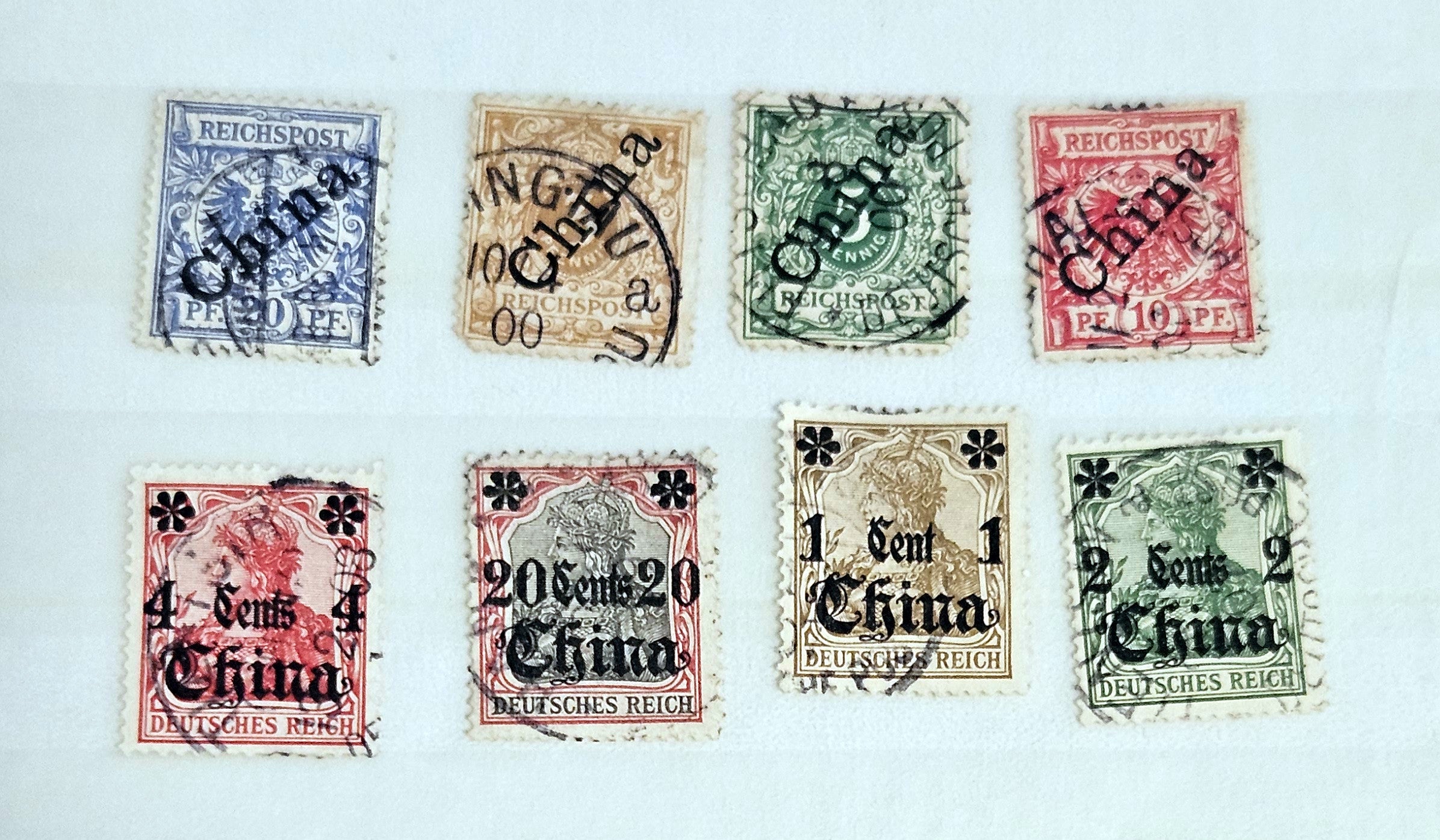 German colonial history with our collection of vintage stamps covering various colonies.