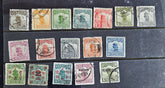 A collection of vintage Chinese postage stamps displayed on a surface, with various colors and designs, predominantly from the early 20th century.