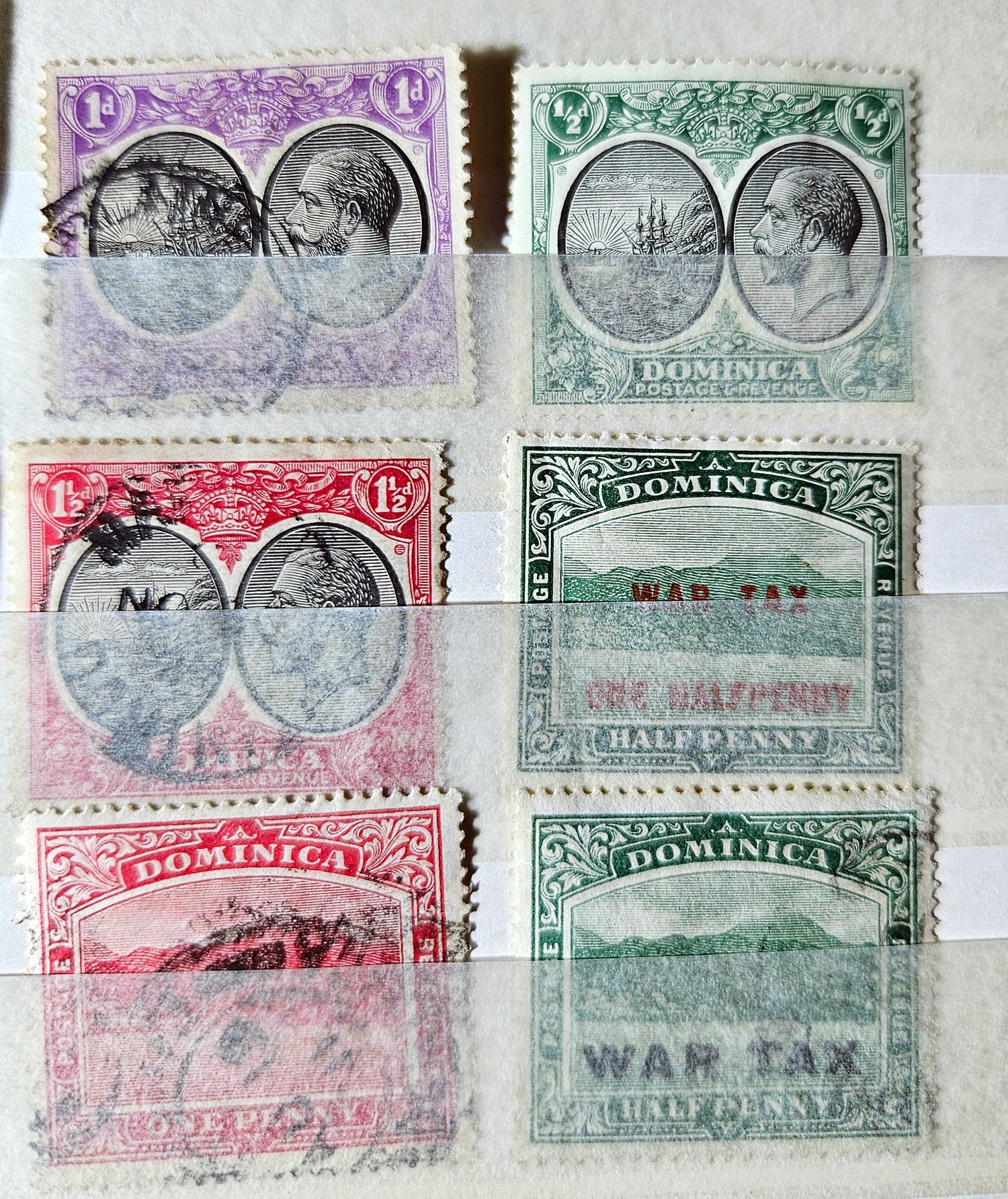 Collection of vintage Dominica stamps with different designs and colors.