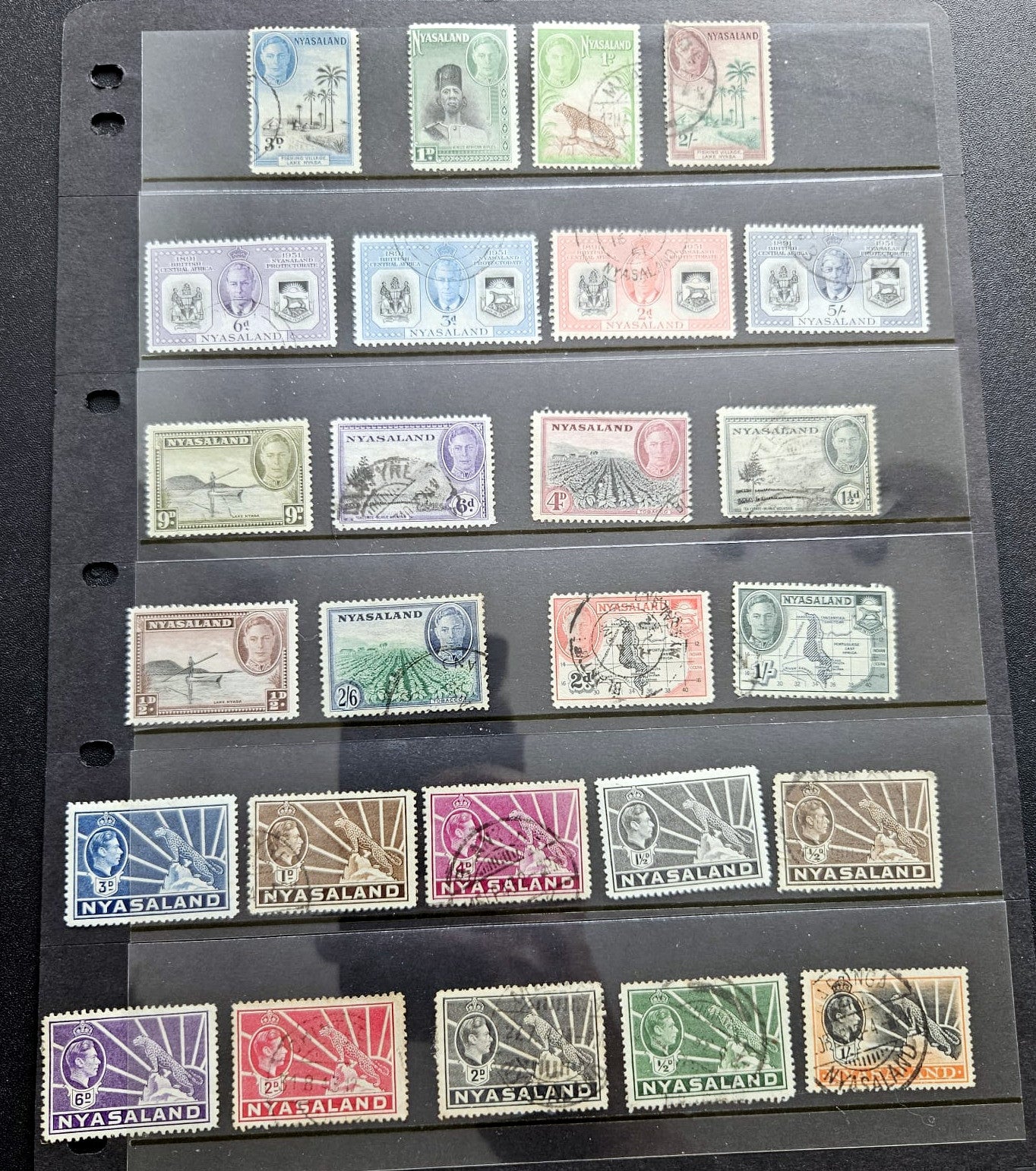 A collection of vintage Nyasaland postage stamps