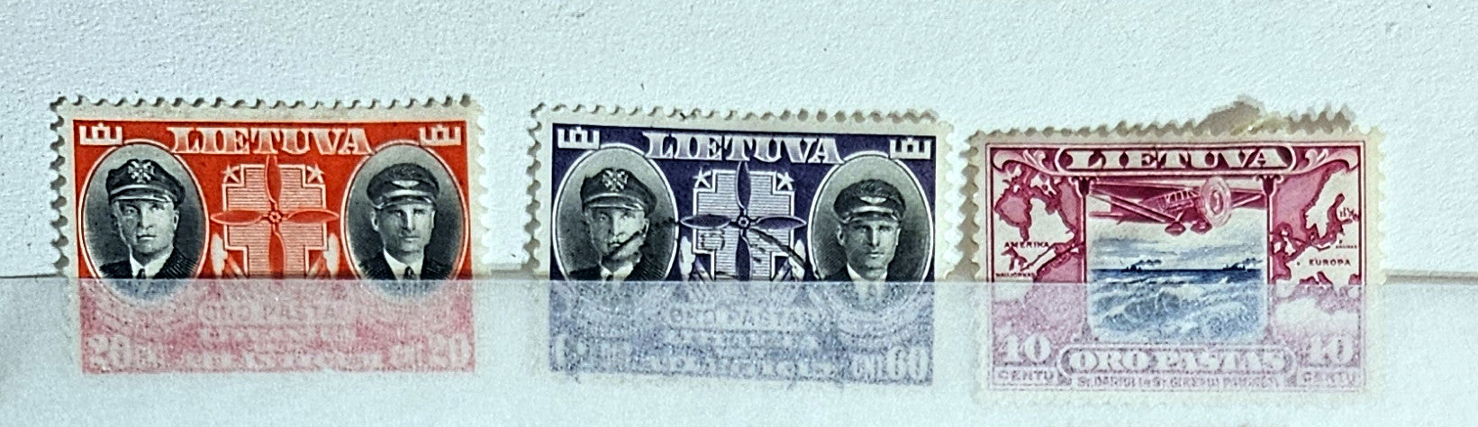 A set of Lithuania postage stamps showcasing various designs, including historical and cultural themes, issued from the early 20th century to modern times.