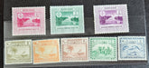 A collection of vintage postage stamps from Maldives Islands, featuring various designs and denominations, displayed on a dark background.