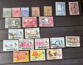 A collection of various vintage Malay state stamps