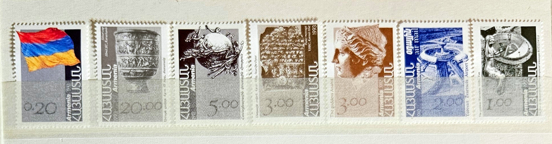 A set of modern Armenian stamps featuring various national symbols and landscapes.
