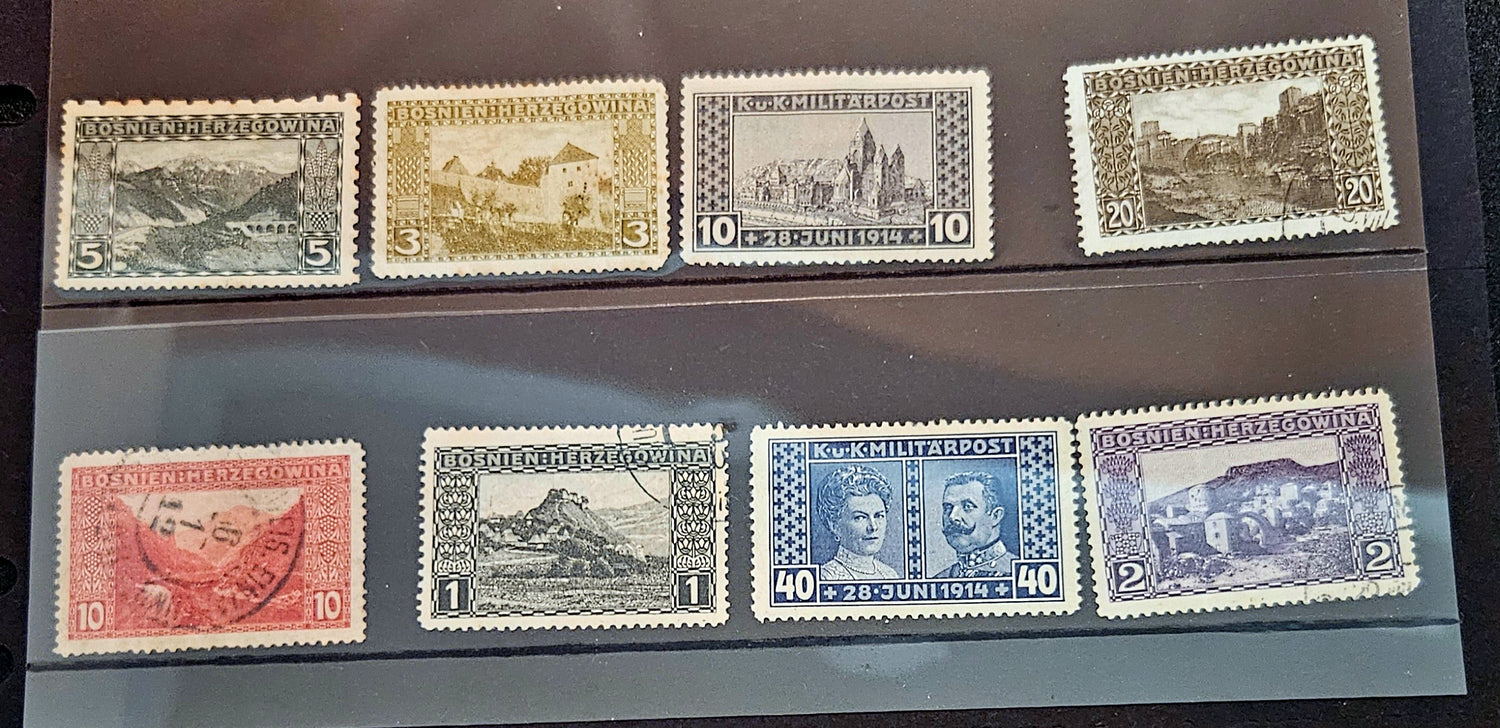 Collection of vintage stamps on a display sheet