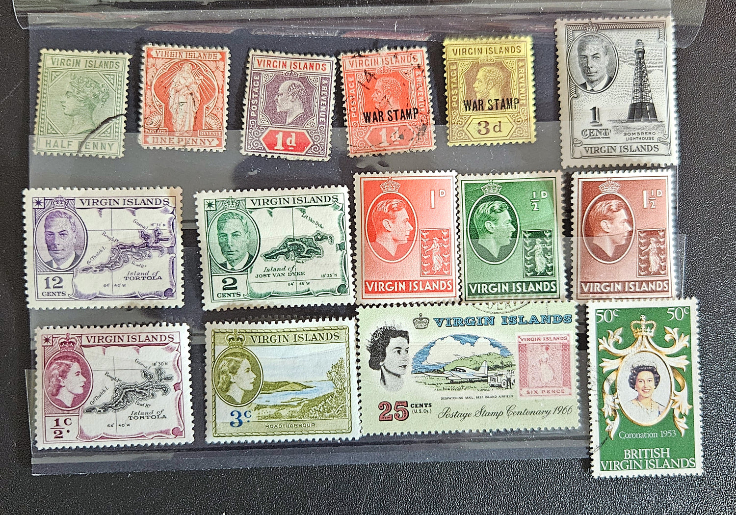 A collection of vintage postage stamps from the British Virgin Islands, featuring various designs and Queen Elizabeth II.