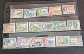 A collection of vintage postage stamps from the British Virgin Islands, featuring various designs and Queen Elizabeth II.