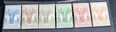 A set of vintage postage stamps from OLTRE GIUBA JUBALAND in various colors displayed on a flat surface.