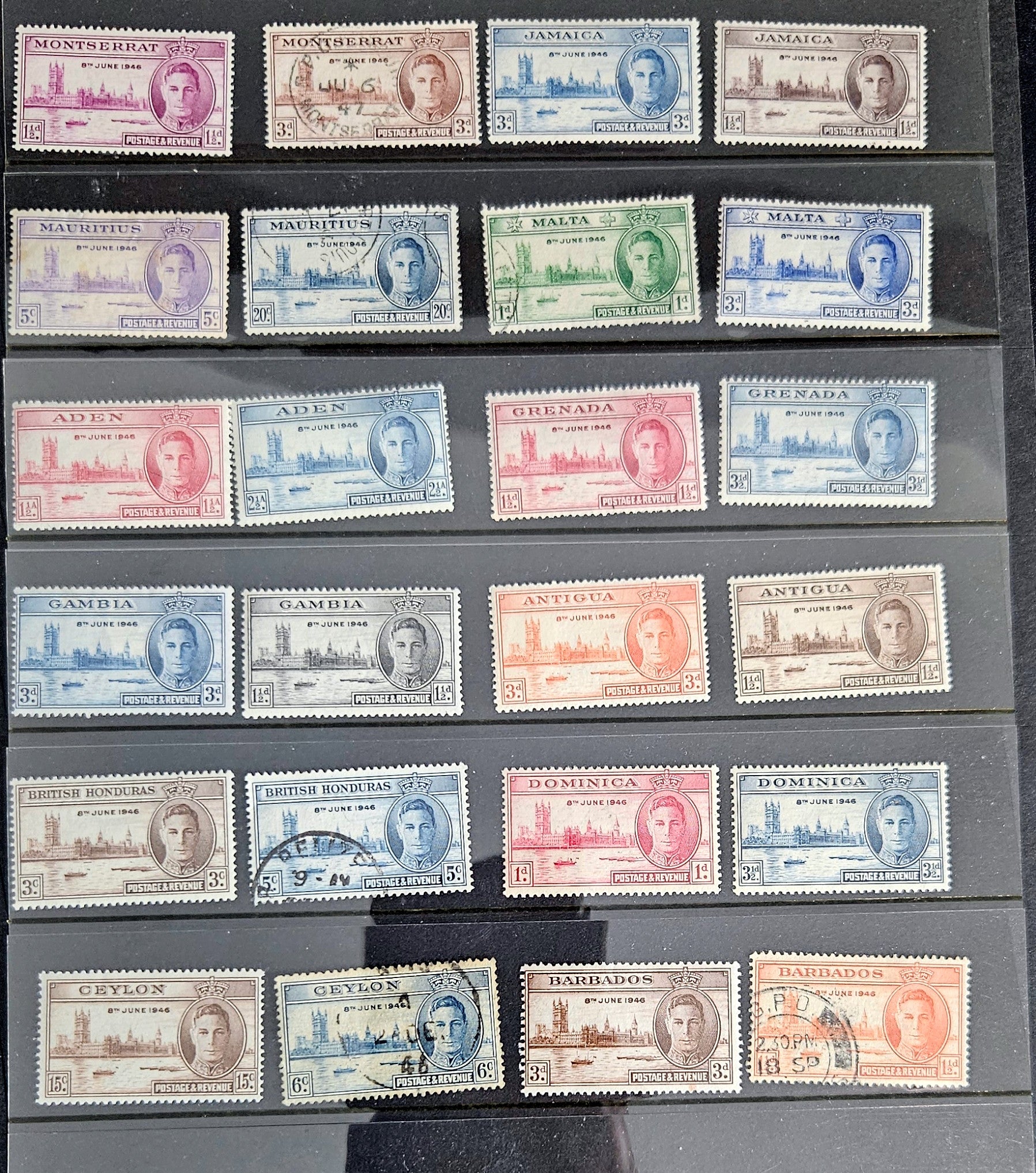 Collection of vintage stamps from various countries on a display slide.