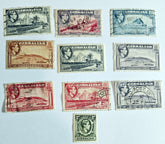 A collection of vintage Gibraltar stamps featuring various designs, colors, and themes, laid out on a white background.