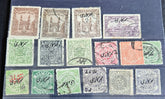 A collection of vintage Indian stamps from various feudatory states including Jhind, Bhopal, Saurashtra, Hyderabad, and Holkar, displayed on a flat surface.