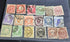 A collection of vintage Japanese stamps from various eras, displayed on a flat surface.