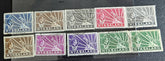 A collection of Nyasaland vintage stamps displaying various images and text, arranged in a row.