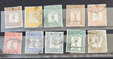 A collection of vintage Palestine postage stamps from 1918-1921 with various designs and colors, displayed in a row.