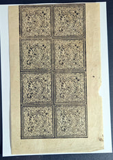 A sheet of vintage Tibet revenue stamps featuring intricate black patterns.