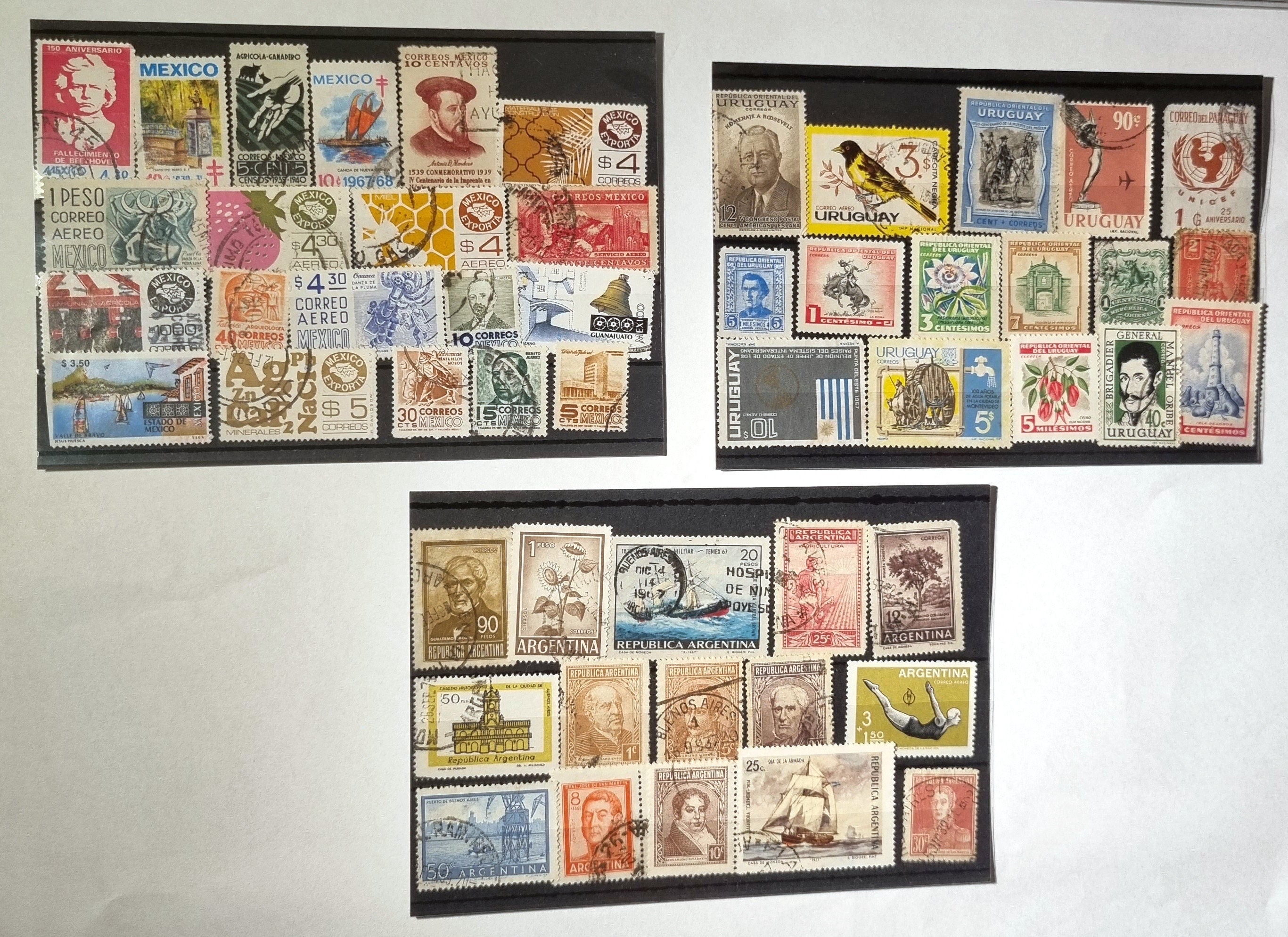 A display of various vintage Latin American postage stamps arranged in two rows on a black background.