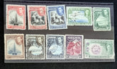A collection of vintage Bermuda postage stamps displaying various designs and colors, arranged in a row.