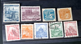 A selection of vintage German stamps from various regions and periods, displayed in a row.