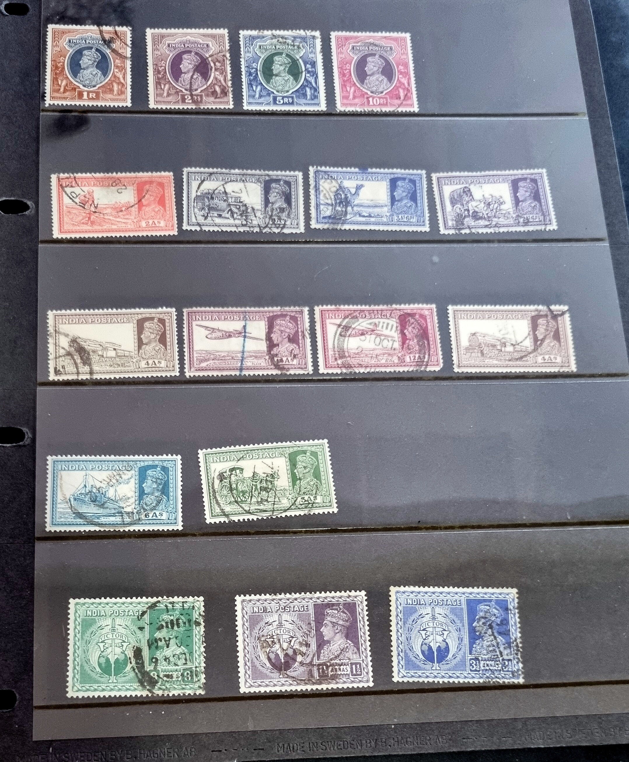 A selection of vintage India stamps from various regions and periods, displayed in a row.