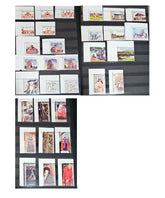 A set of vintage India postage stamps displayed in a row, showcasing various designs including portraits and images of animals and flowers.