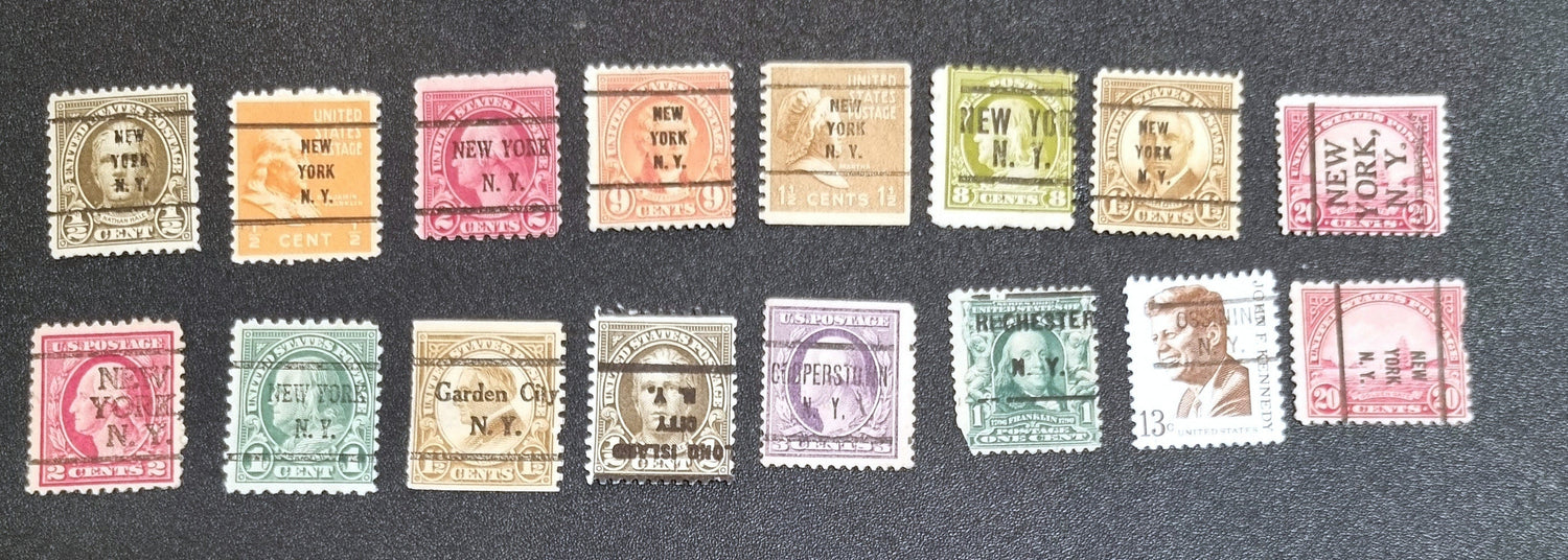 A collection of vintage USA postage stamps with various overprints and cancellations.