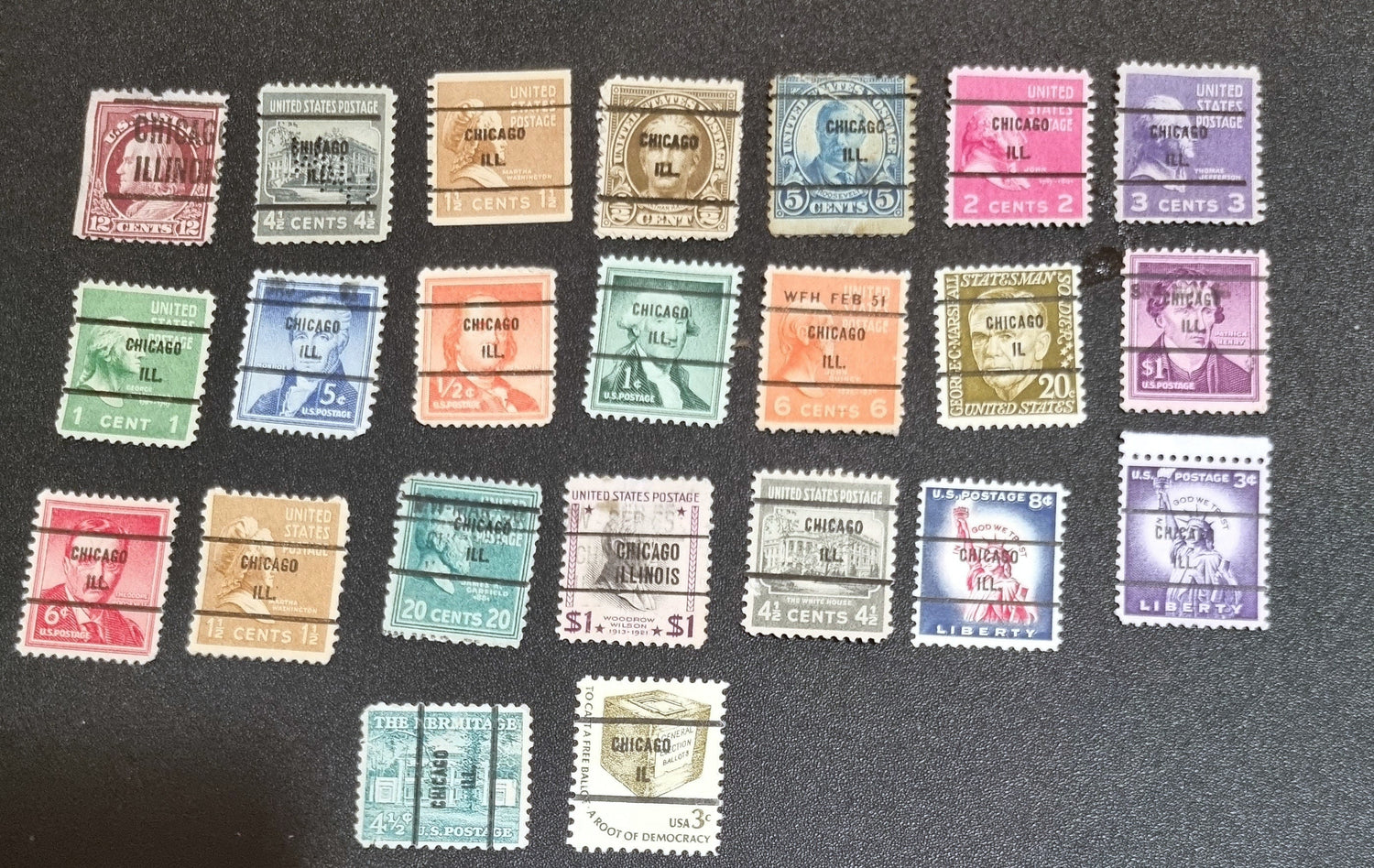 A collection of vintage USA postage stamps with various overprints and cancellations.