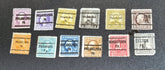 A collection of vintage USA postage stamps with various overprints and cancellations.