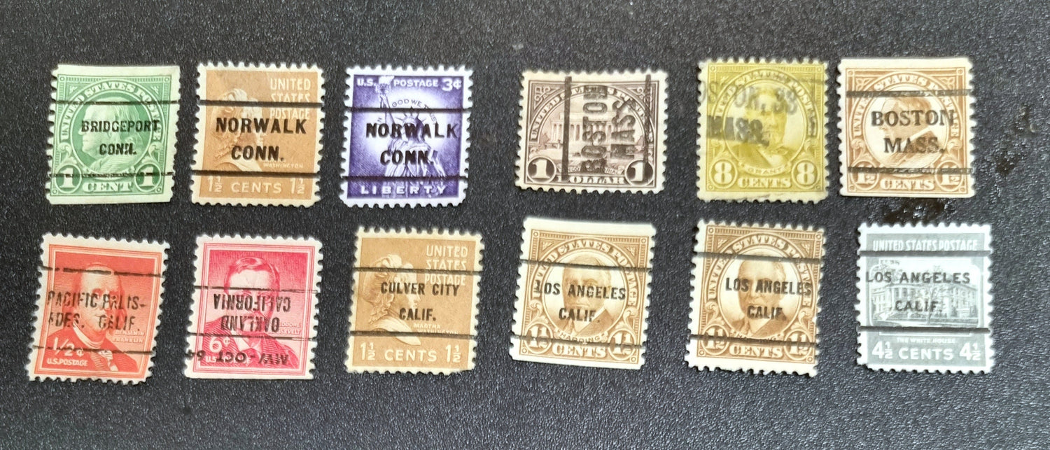 A collection of vintage USA postage stamps with various overprints and cancellations.