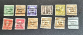 A collection of vintage USA postage stamps with various overprints and cancellations.