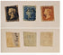 Three vintage British one penny postage stamps are shown above three blank or handwritten beige paper pieces on a light neutral background. The top row stamps are dark blue-black, blue, and reddish-brown, with &