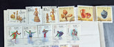 A collection of modern Belarusian stamps displayed in a row, featuring various designs including cultural figures and national symbols.