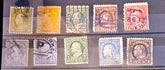 A set of ten vintage postage stamps displayed Benjamin Franklin