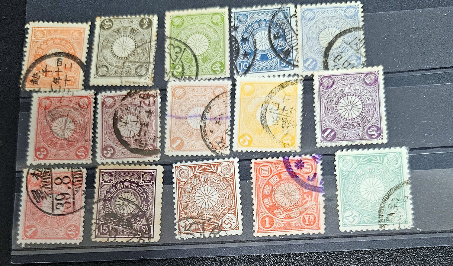 Collection of vintage postage stamps of imperial Japan