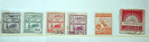 Six vintage Japanese postage stamps in different colors (blue-gray, green, orange, purple, red-orange, and red) lined up horizontally on a white background.