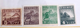 Four vintage Japanese postage stamps displayed side by side on a white background. The stamps are brown, dark gray-brown, green, and olive green, featuring illustrations of mountains, a farmer, a worker, and a hut, with denominations of 5, 2.