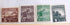 Four vintage Japanese postage stamps displayed side by side on a white background. The stamps are brown, dark gray-brown, green, and olive green, featuring illustrations of mountains, a farmer, a worker, and a hut, with denominations of 5, 2.