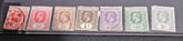 Authentic vintage Leeward Islands postage stamps archive featuring various royal eras by StampArtefact.