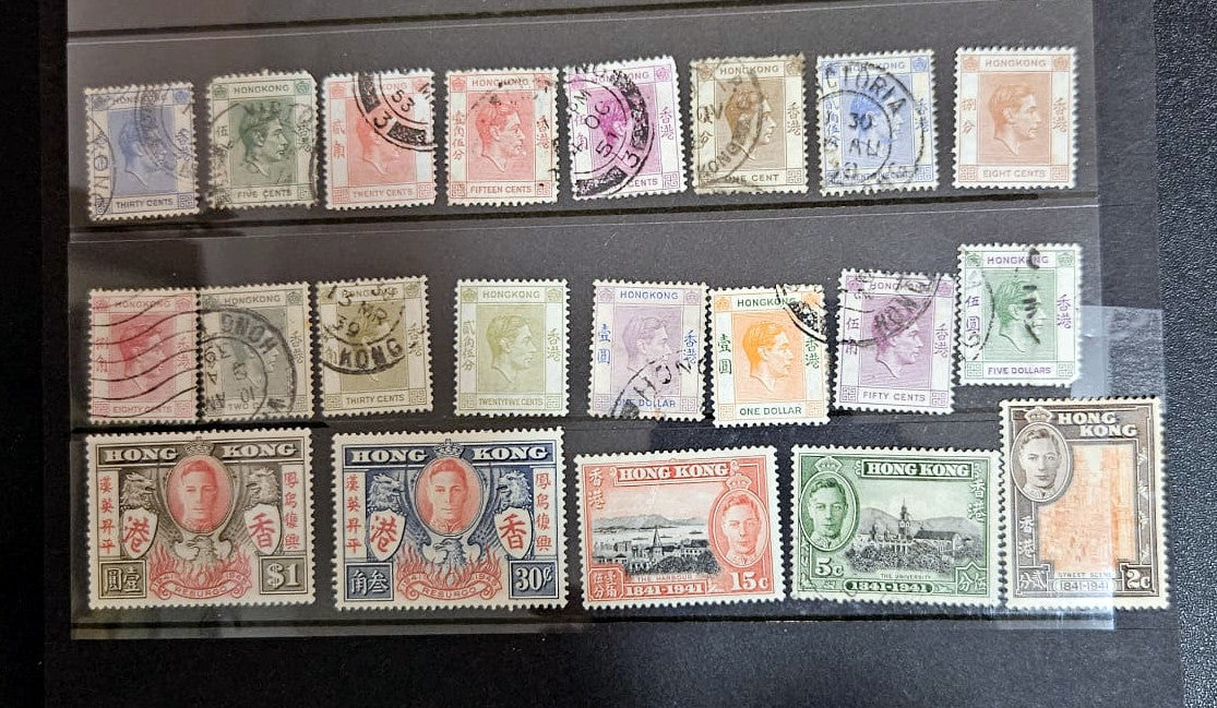 Collection of vintage stamps from Hong Kong issued by King George VI