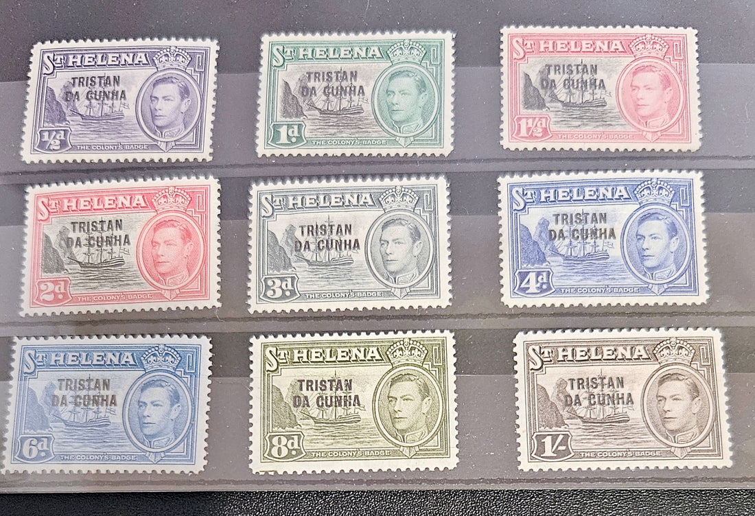 Collection of Tristan da cunha stamps featuring various designs and colors on a gray background.