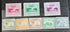 A collection of vintage postage stamps from Maldives Islands, featuring various designs and denominations, displayed on a dark background.