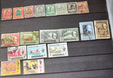 A collection of various vintage Malay state stamps
