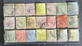 A collection of vintage postage stamps from Mauritius displayed in a row, featuring various designs and denominations.