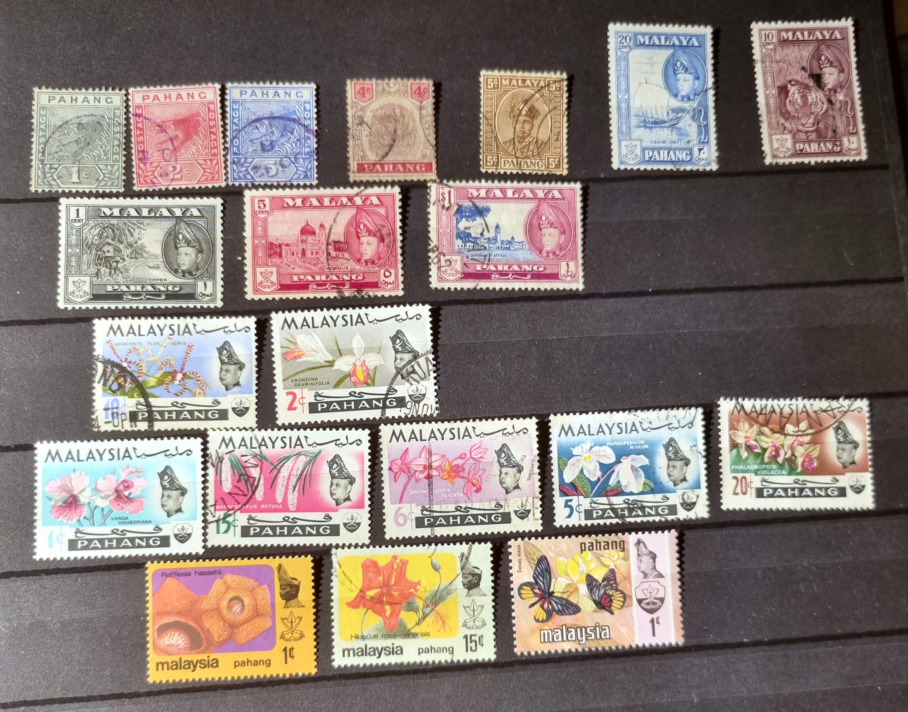 A collection of various vintage Malay state stamps 