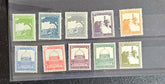 A collection of vintage Palestine postage stamps from 1918-1921 with various designs and colors, displayed in a row.