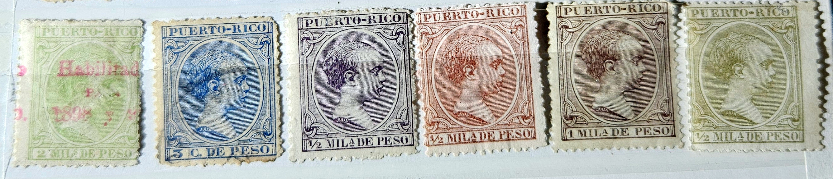 Set of six vintage stamps from Puerto Rico with different colors and designs.