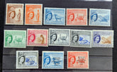 A set of twelve vintage Somalia postage stamps arranged in a 3-by-4 grid on a black background. The stamps feature various colors including blue, orange, green, pink, and gray, with Queen Elizabeth II depicted on each stamp.
