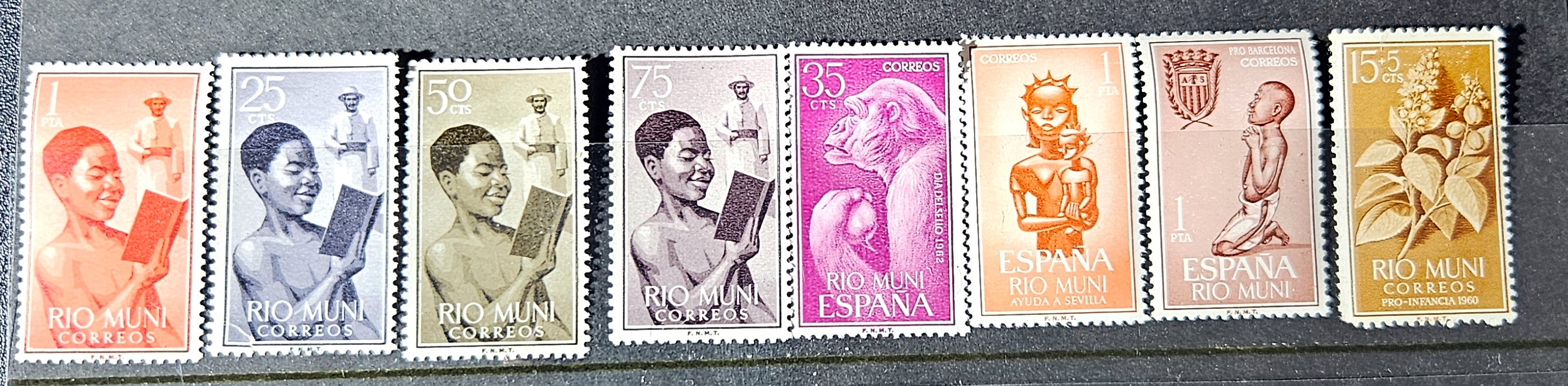 Set of eight vintage stamps featuring different designs and colors.
