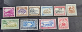 A set of ten vintage Western Samoa postage stamps displayed on a dark textured background, featuring various colors and designs with country names printed on them.